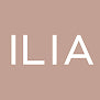 ILIA logo on a beige background